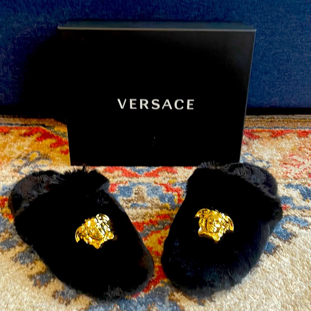 Versace never worn, size 39, faux fur slippers with gold decoration.